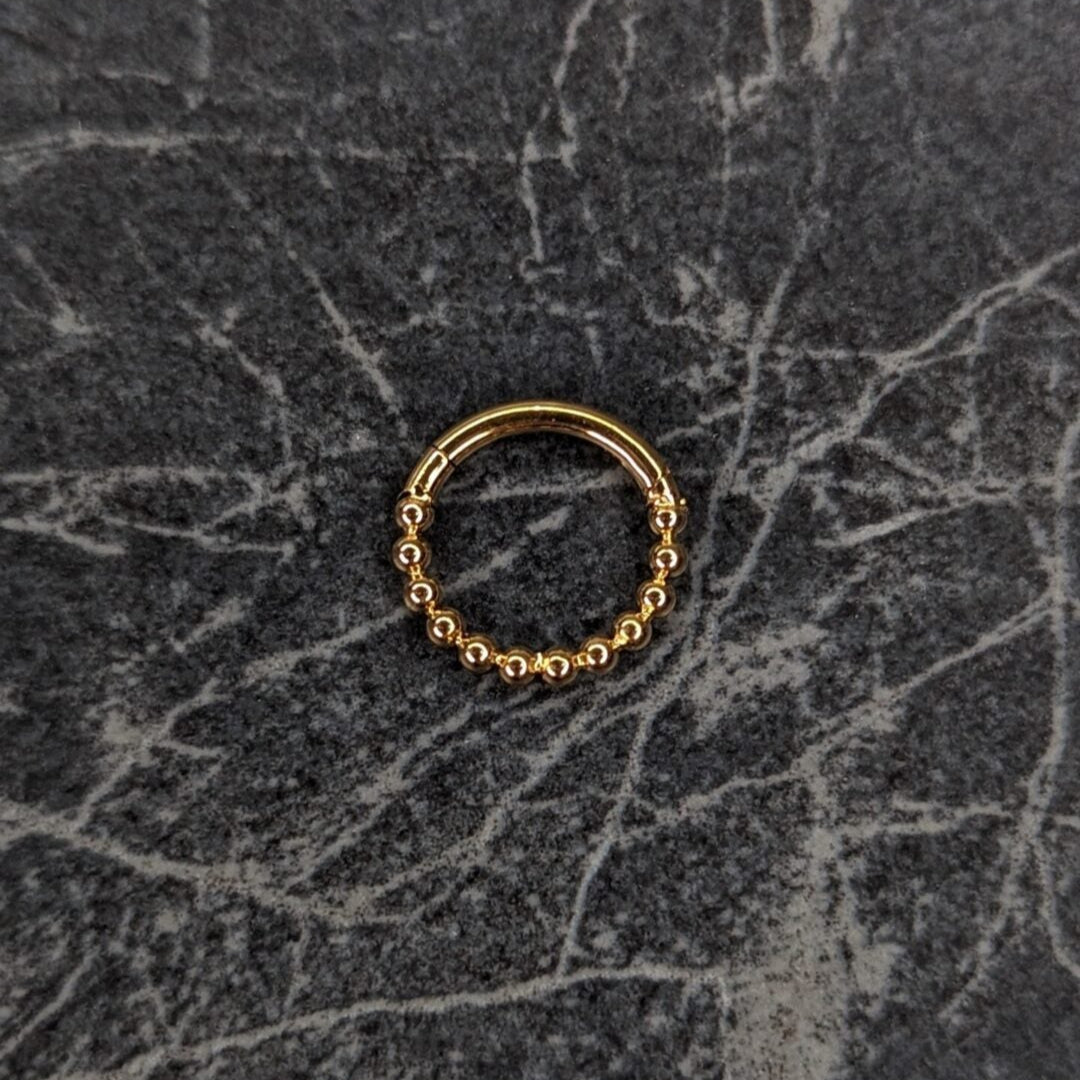 Bubble clicker PVD oro