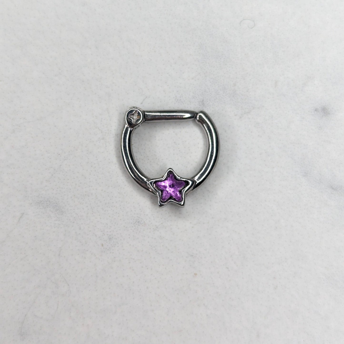 Clicker con zircone stella viola image 0