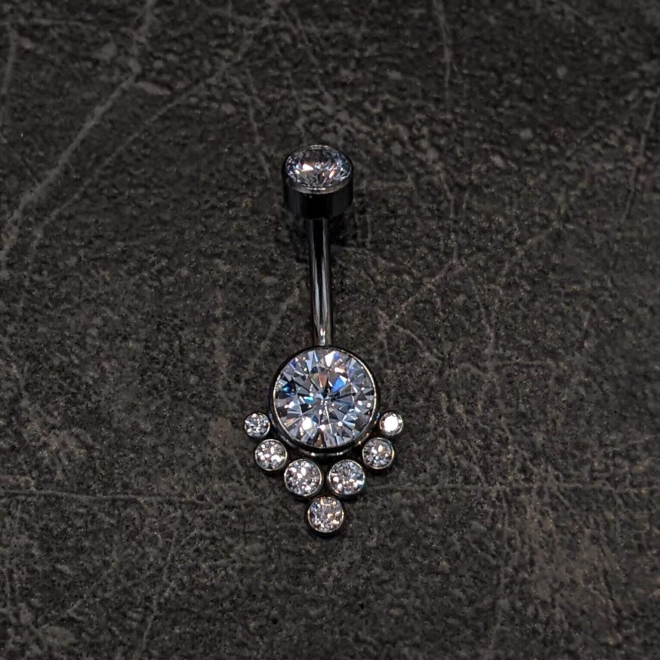 Big shiny navel bar