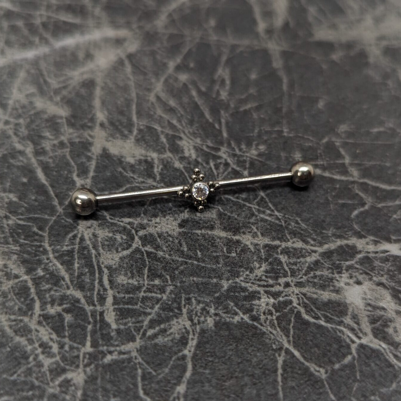 Industral barbell with central hole image 0