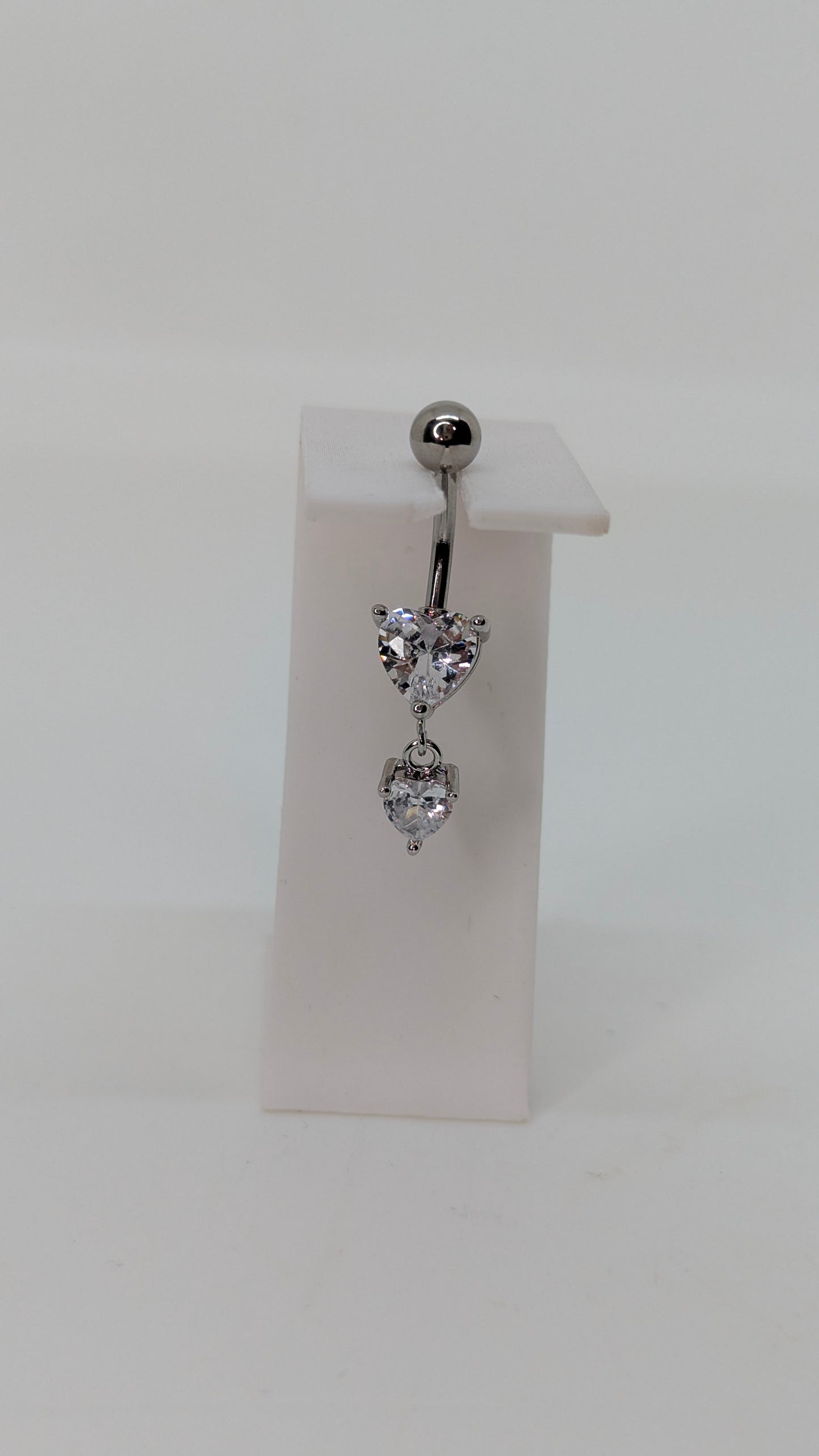 Dangling heart navel bar