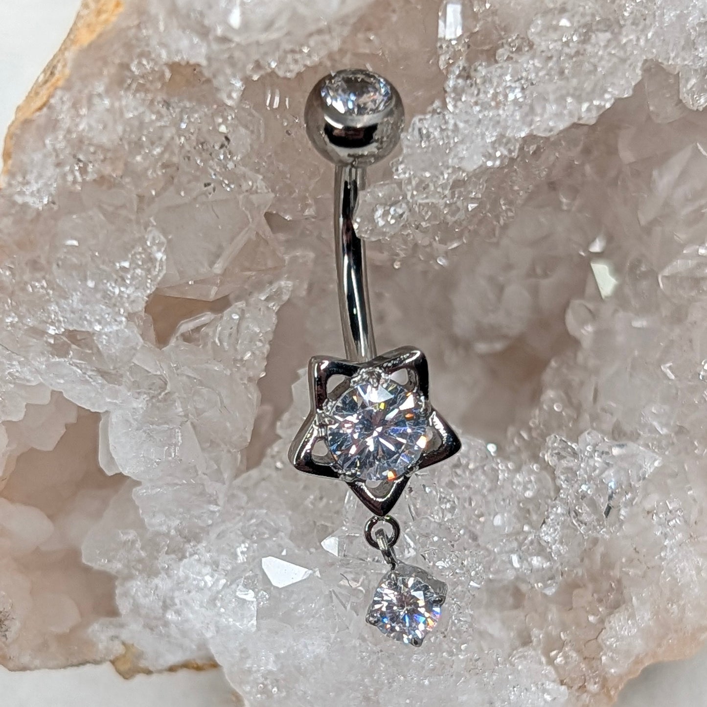 Dangling star navel bar