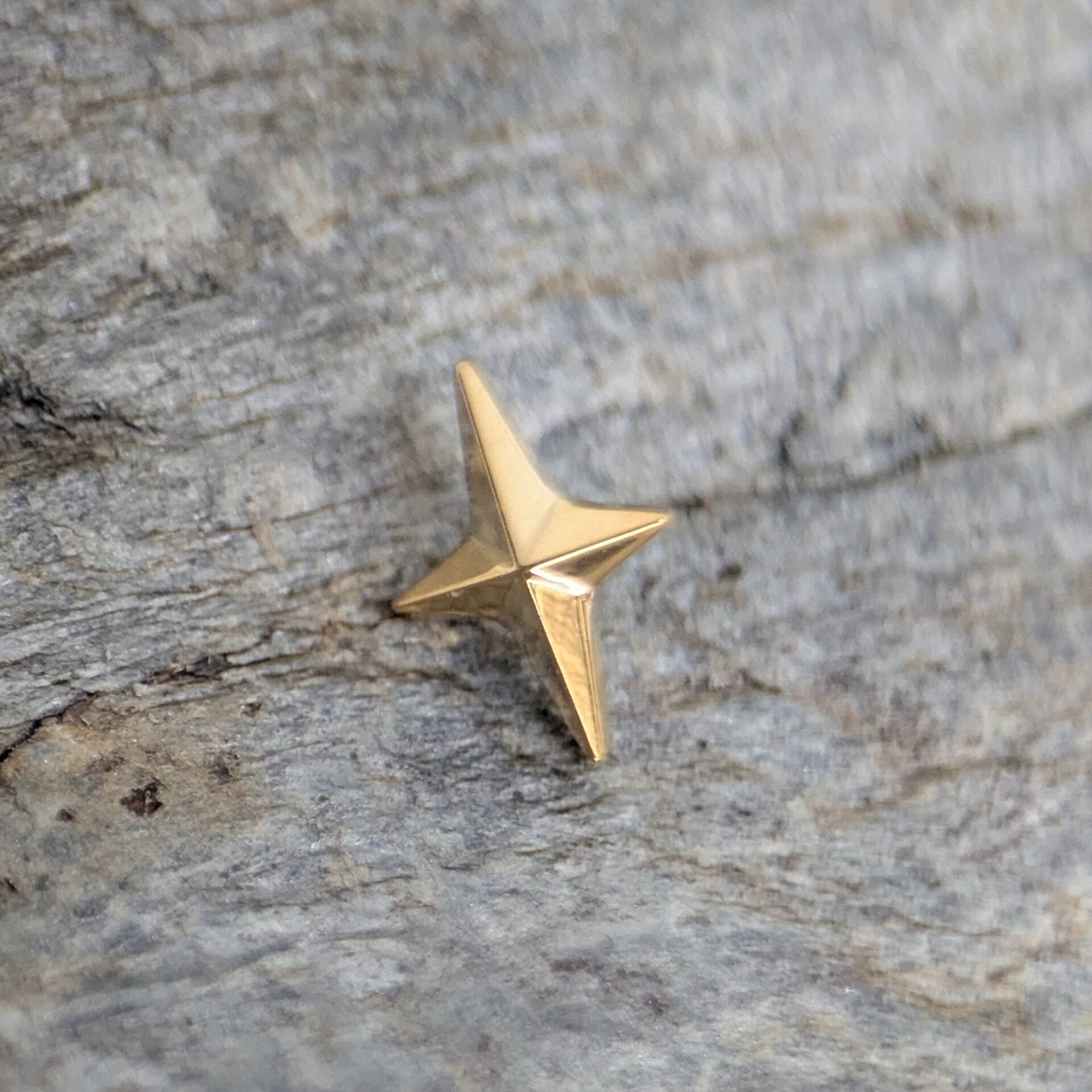 Four point star - PVD oro image