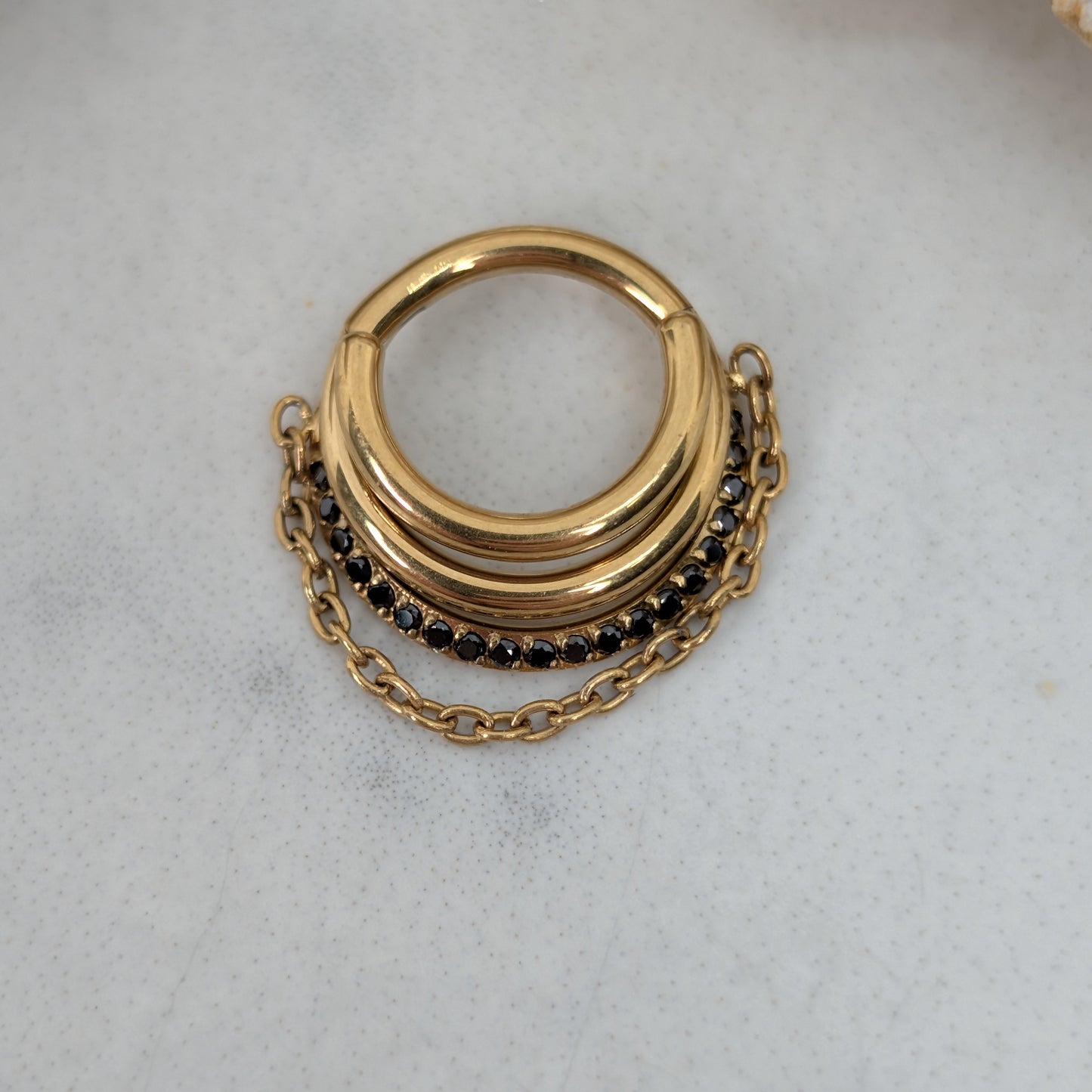 Graduated clicker with chain PVD gold