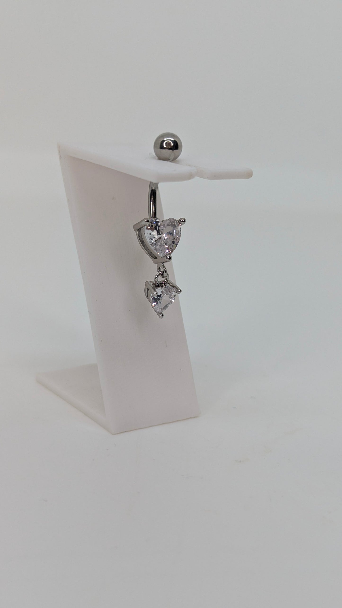 Dangling heart navel bar