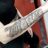 tattoo scritta corsivo